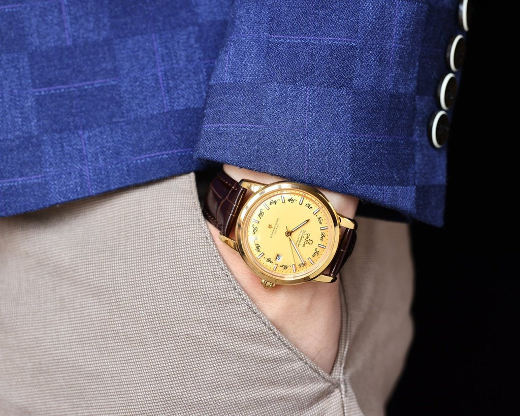 VARELLO CLASSIC 40MM GOLD-TONE CASE ANNUAL CALENDAR WATCH