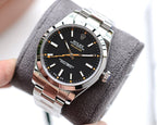 CLASSIC STAINLESS STEEL BLACK DIAL ORANGE